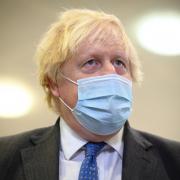 Prime Minister Boris Johnson wearing a mask.  Credit: PA