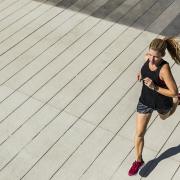 Photo via Pixabay shows a woman running.