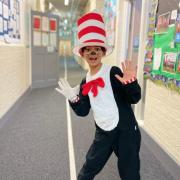 A student at Cheam Common Junior Academy in Surrey dressed as The Cat in the Hat (PA)