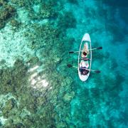 People kayaking in the Maldives. Credit: Canva