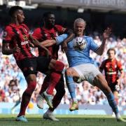 Bournemouth's Lloyd Kelly, Jefferson Lerma and Manchester City's Erling Haaland battle for the ball during the Premier League match at the Etihad Stadium, Manchester. Pic: PA Images