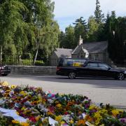 Queen Elizabeth II's coffin seen for first time as she begins her final journey