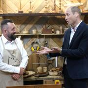 The Prince of Wales during a visit to Faithworks Carpentry Workshop