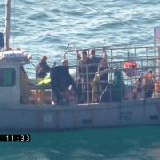 Daniel Turner's vessel Tony Lou prior to being boarded by Cornwall IFCA officers - complete with electrical cable entering the sea