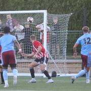 Tommy Stagg, second right, fires home Weymouth's third goal