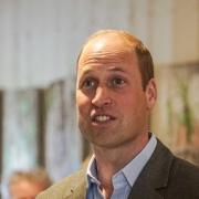 Prince William served up veggie burgers, surprsing diners in the process