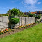 What is the maximum height of a garden fence in the UK?