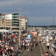 A busy Poole Quay in the sunshine as hundreds of people enjoy Quay For My Car. Picture by Frazer Hockey of the Dorset Camera Club.