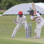 Luke Webb, right, scored 75 in Dorset's first innings