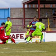 Remus Nixon pictured grabbing Hammers' second goal