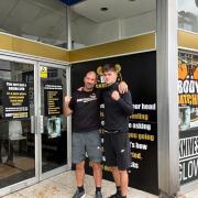 Marc Plunkett and son MJ outside BodySnatchers in Boscombe.