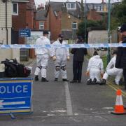 Police and forensics in Walpole Lane, Boscombe