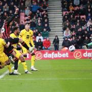 Enes Unal struck in stoppage time to ensure the spoils were shared