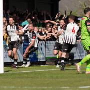 Wimborne will hope to clinch promotion on Tuesday after a home draw with Frome