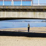 A police officer on the beach at Bournemouth