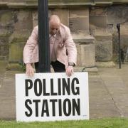 People can vote in person, by post or by sending someone in their place. (Danny Lawson/PA)