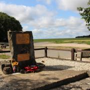 Memorial stone at the entrance to Trrant Rushton airfield. (Photo: Edward Griffiths)