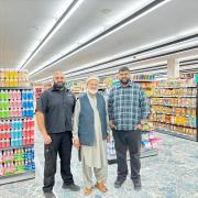 Tariq (left) with Usman (right) and their father (middle).