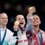 Bryony Page, centre, won gold in Paris