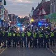 Officers at the protest in Weymouth on Sunday.