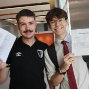 Students at Bournemouth School  receive their A level results. Ben Coles and Dan Moss.