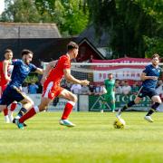 Harry Thomas (Poole) on the ball against Wimborne Town on the 26th August 2024.