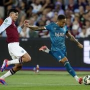 Bournemouth's Marcus Tavernier in action against West Ham United's Edson Alvarez during the Carabao Cup second round match at the London Stadium. Picture date: Wednesday August 28, 2024.