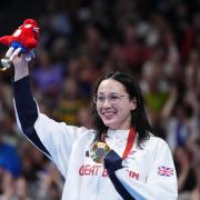 Great Britain's Alice Tai on the podium with the gold medal after winning the Women's 100m Backstroke - S8 Final at the Paris La Defense Arena on day three of the Paris 2024 Summer Paralympic Games. Picture date: Saturday August 31, 2024.