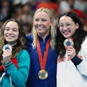 Neutral Paralympic Athletes' Viktoriia Ishchiulova holding her Silver medal, USA's Jessica Long holding her Gold medal and Great Britain's Alice Tai holding her Bronze medal won in Women's 100m Butterfly S8 Final at the Paris La Defense Arena on day Ten.