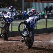 Poole Pirates Speedway v  Workington Comets  in Championship play-off semi-final 1st leg at Wimborne Road. Heat 5 - Ben Cook (red) and Zach Cook (blue)