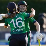 Christina Coulter Reilly, right, celebrates with Leah Paul after hitting the winning runs against England (Damien Eagers/PA)