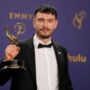 Richard Gadd poses in the press room with the award for outstanding writing for a limited or anthology series or movie for Baby Reindeer during the 76th Primetime Emmy Awards (AP Photo/Jae C. Hong)