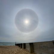 'I was hoping it was a port hole to Ibiza' Halo sun captured in Bournemouth