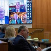 Mark Meadows, left, Stephen Binhak and Jim Eastman appear virtually during a pre-trial hearing in one of the fake electors cases (Cheryl Evans/The Daily News-Sun via AP)