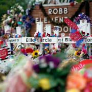 FILE IMAGE – A memorial for the Robb Elementary School victims in 2022, taken in the days after the massacre (Eric Gay/AP)