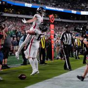 Atlanta Falcons wide receiver Drake London (5) celebrates his touchdown with Atlanta Falcons guard Chris Lindstrom (63) during the second half of an NFL football game against the Philadelphia Eagles (Matt Rourke/AP)