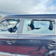 The cars were found with their windows smashed and shattered glass around each vehicle at the Asda car park.