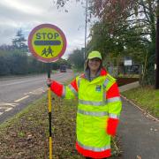 Mrs Baldwin in her lollipop lady uniform