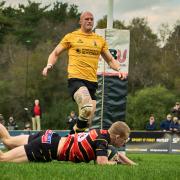 Maverick Goodchild dives over to score during the match between Bournemouth and Winchester  played