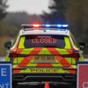 Road closed after 'rolled over truck'