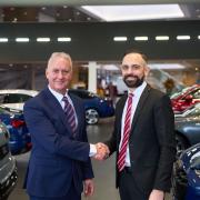 DRIVING SEAT: Dorset Chamber chief executive Ian Girling, left, and Elliott Onaran, who is head of business at Poole Audi