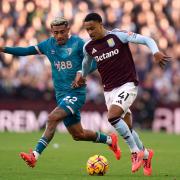 Bournemouth's Julian Araujo and Aston Villa's Jacob Ramsey (right) battle for the ball during the