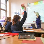 A teacher and students in a classroom