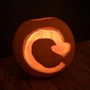 Pumpkin with recycle logo carving