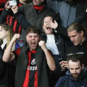 Fans celebrate AFC Bournemouth's famous victory over Manchester City.