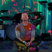 Chris Martin has fallen through a stage trapdoor while performing with Coldplay (Peter Byrne/PA)