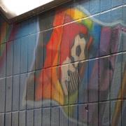 AFC Bournemouth badge in the mural on a rainbow flag before the vandalism.