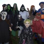 Christchurch Bonfire and Fireworks Display at Stanpit Recreation Ground. Pic: Keeping it in the family; dressed in Halloween Fancy Dress are the Moxham, Message and Foch Families, from Christchurch.