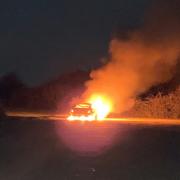 A car fire at Ocknell Pond Car Park near Stoney Cross.