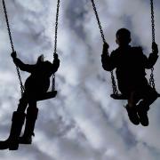 File photo dated 04/03/17 of children enjoying playing on swings. The UK and Scottish governments are failing to use their powers to reduce poverty, a report by a leading charity has found, as rates of extreme deprivation rise. Issue date: Monday October